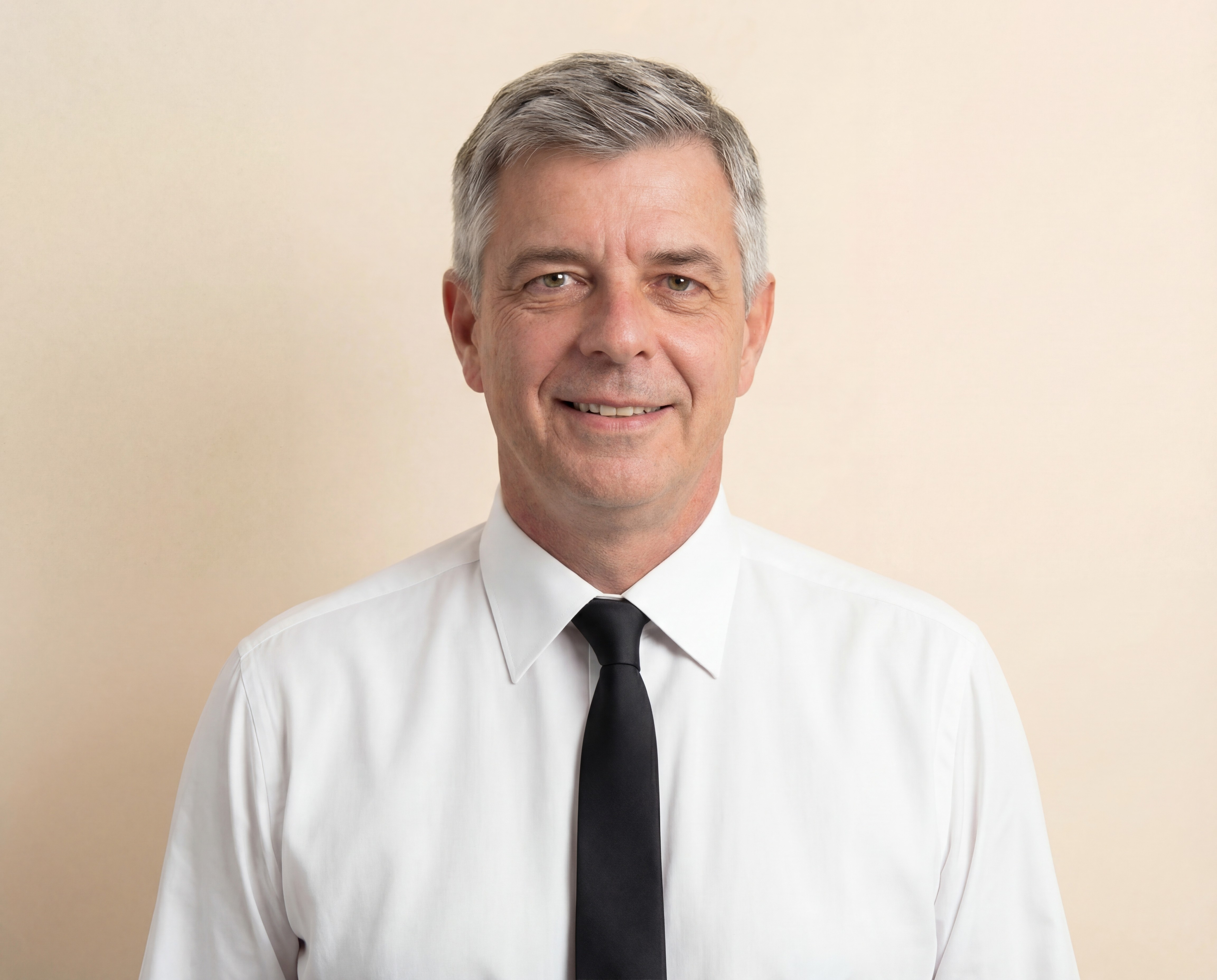 A smooth, abstract organic shape with pink and green swirls floats against a muted green background, showcasing modern art design and fluid form.