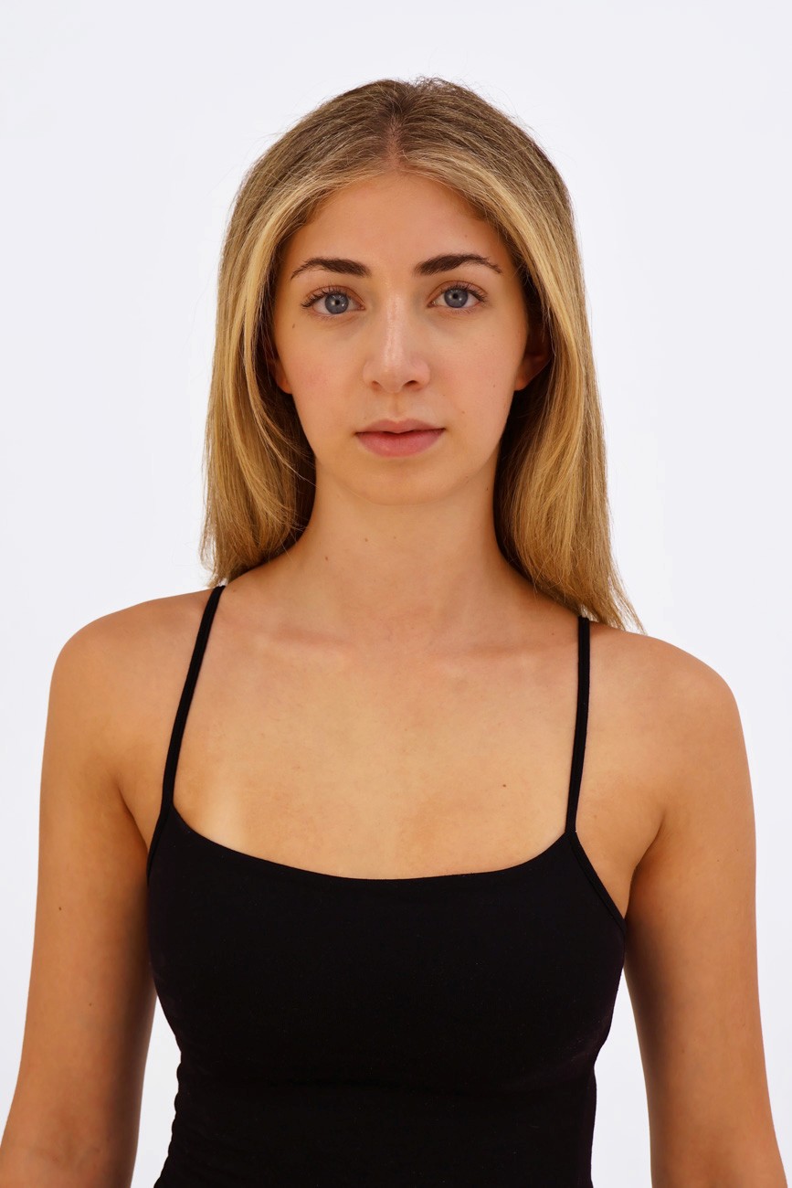 Front-facing headshot of a dancer