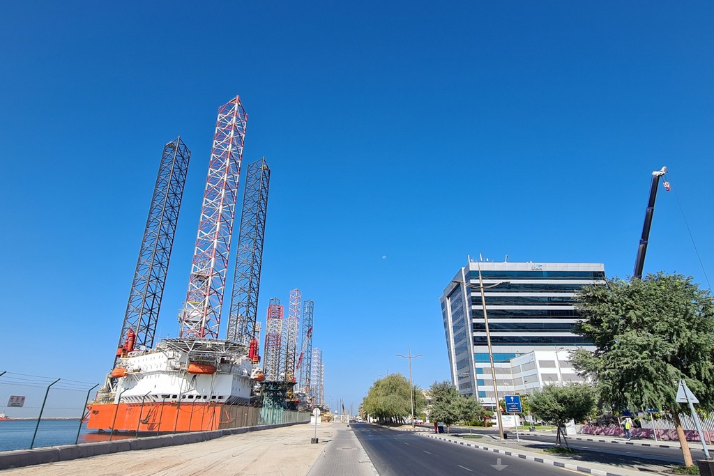 Scenic view of Dubai Maritime City highlighting its contemporary skyline and vibrant harbor filled with boats.