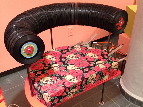 chair made of album records and skull fabric
