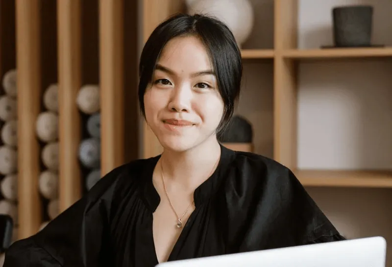 Portrait of a professional woman smiling in a modern office interior