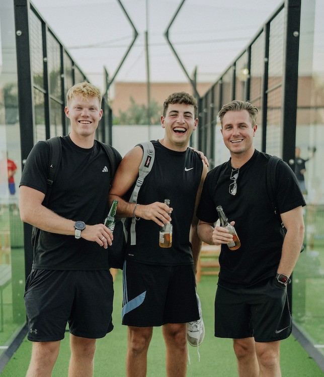 flat lay shot of spa amenities by the bathtub