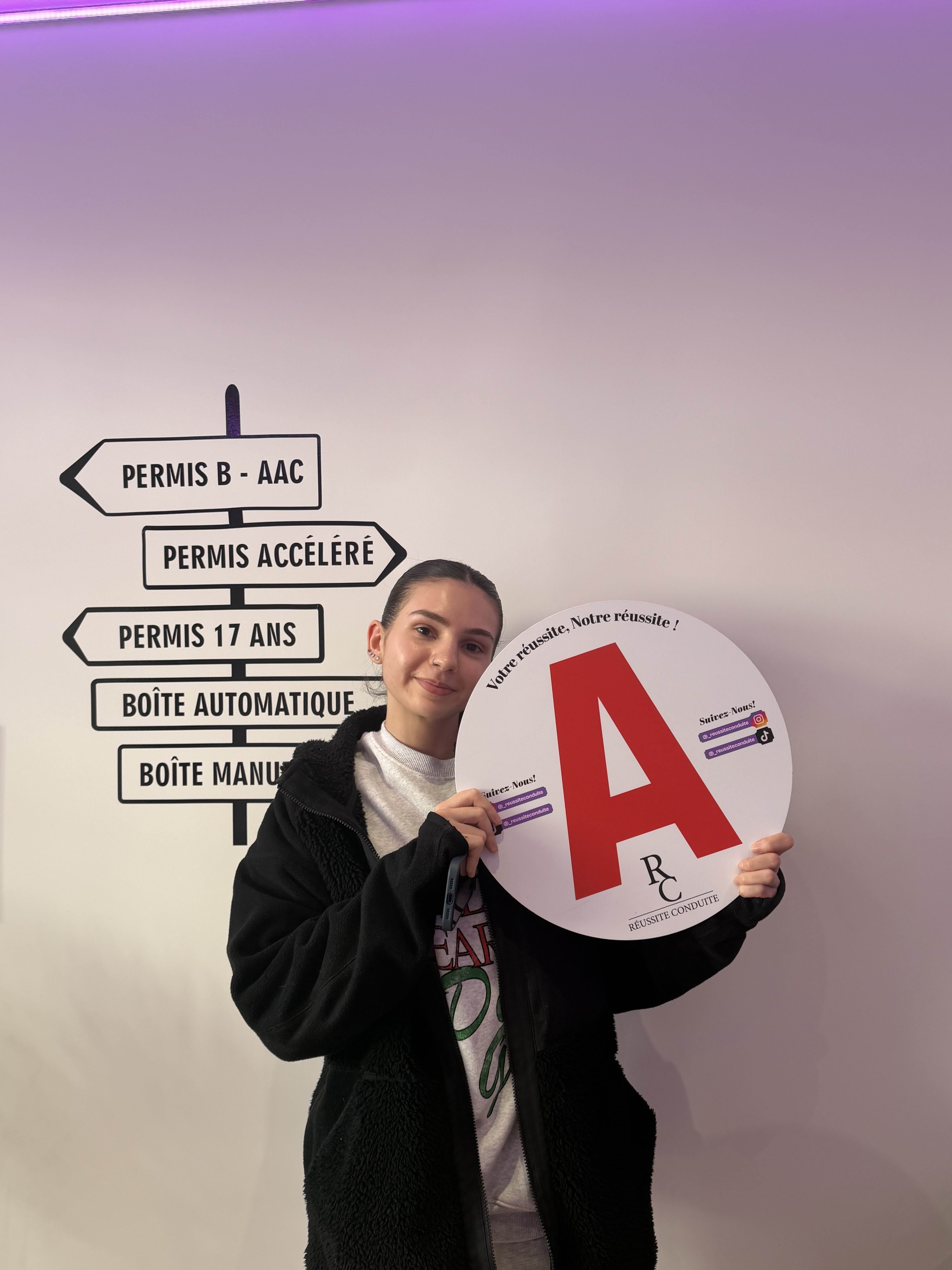 man in black jacket holding blue tablet computer