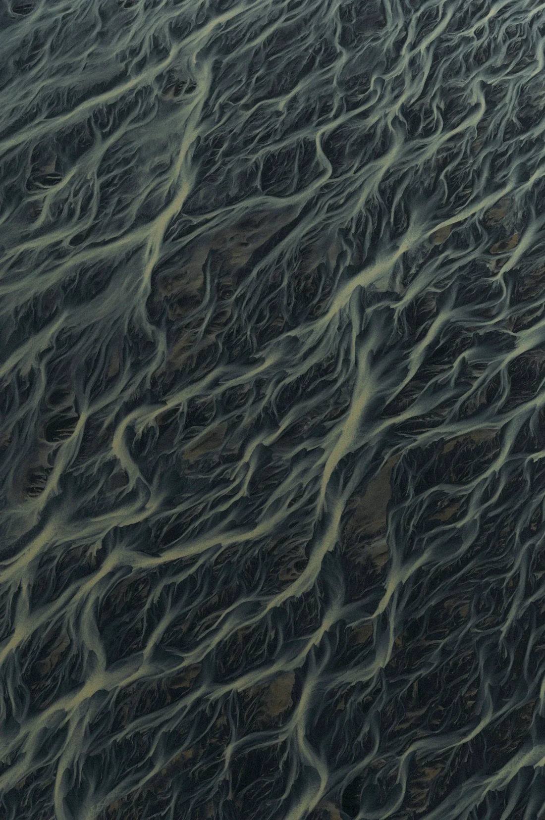 Aerial view of braided glacial river channels in Iceland