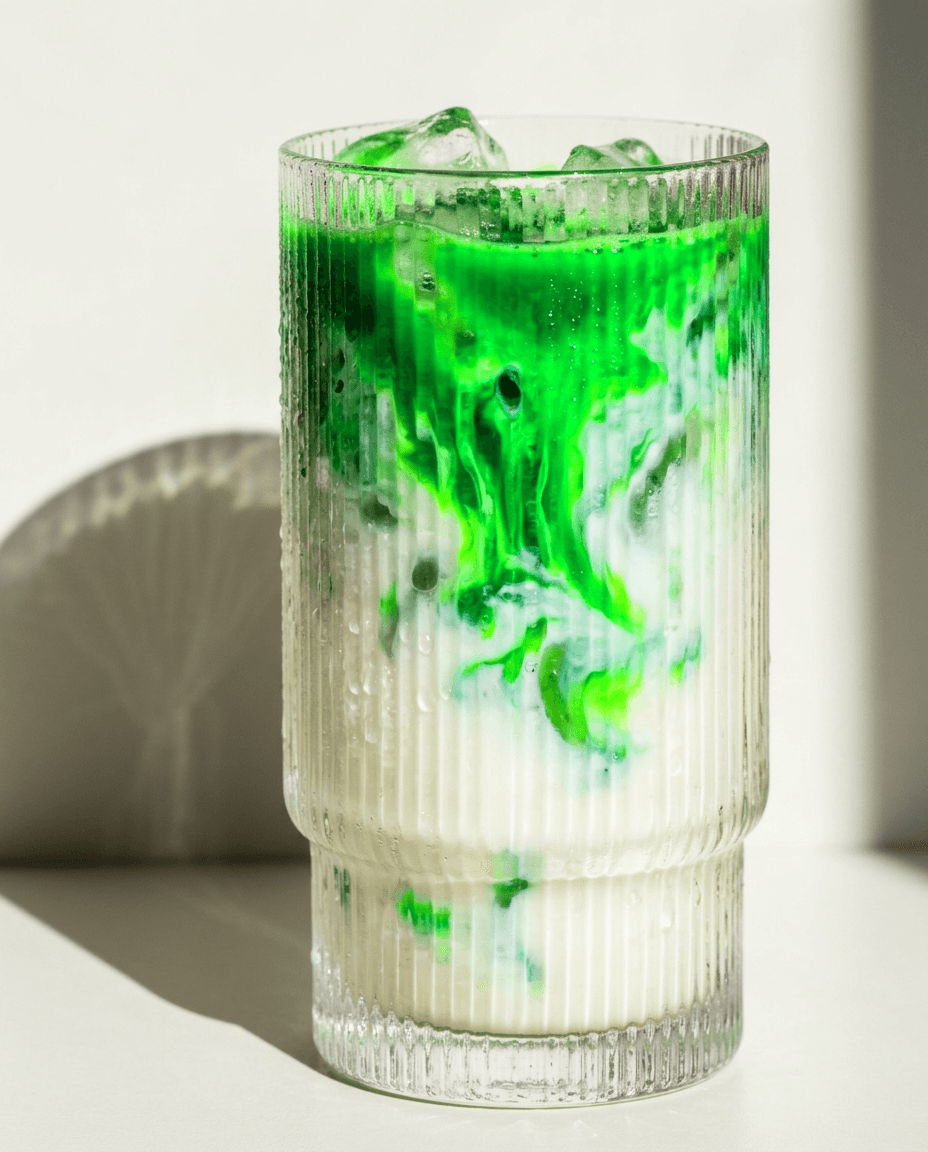 milky iced matcha marbling in ribbed glass