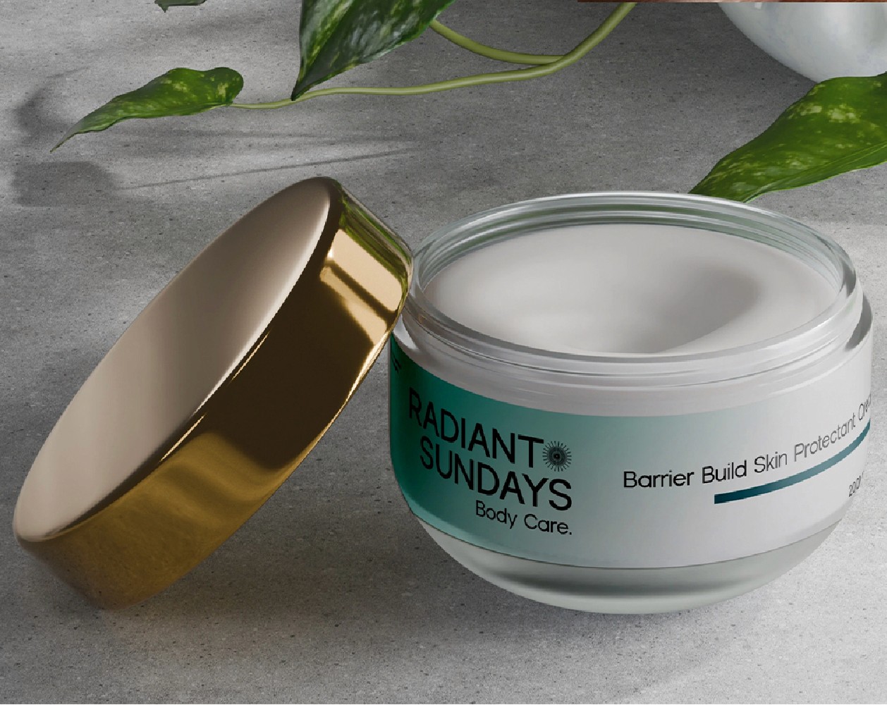 A close-up of a pink cocktail in a martini glass, set against a nighttime background with soft, blurred colors.