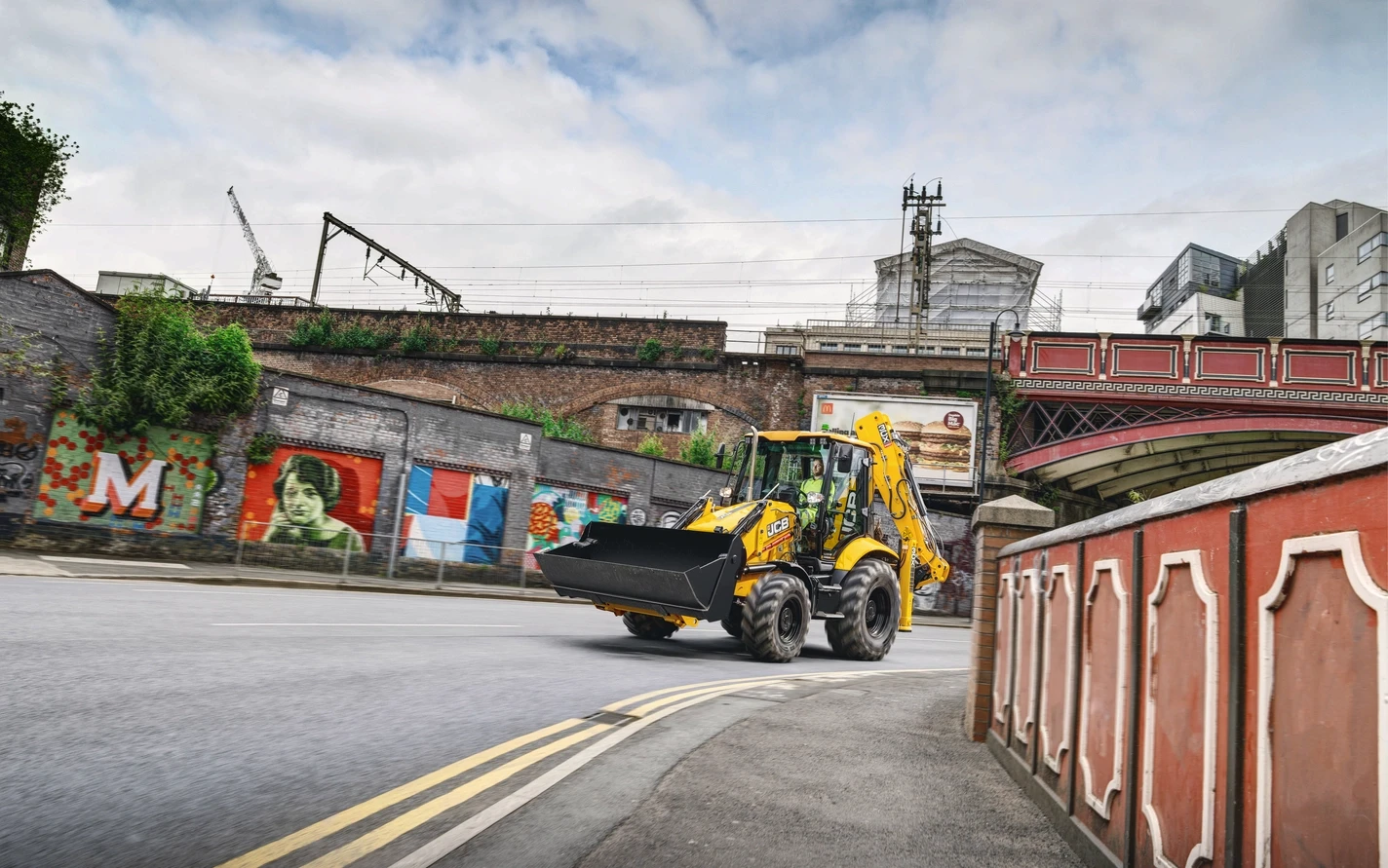WHDX construction machinery on an urban route
