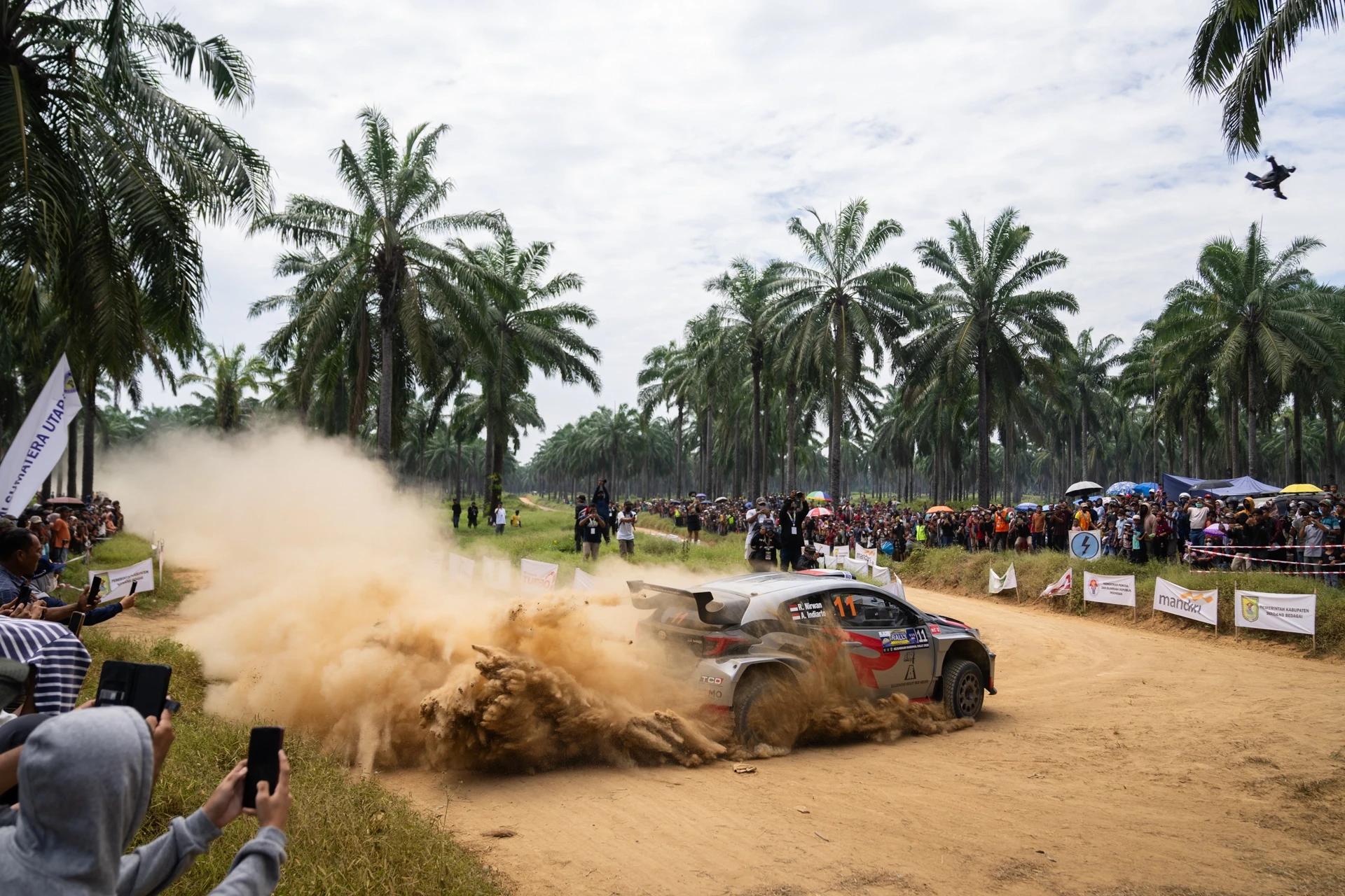 Rally Engineering team working with driver and co-driver
