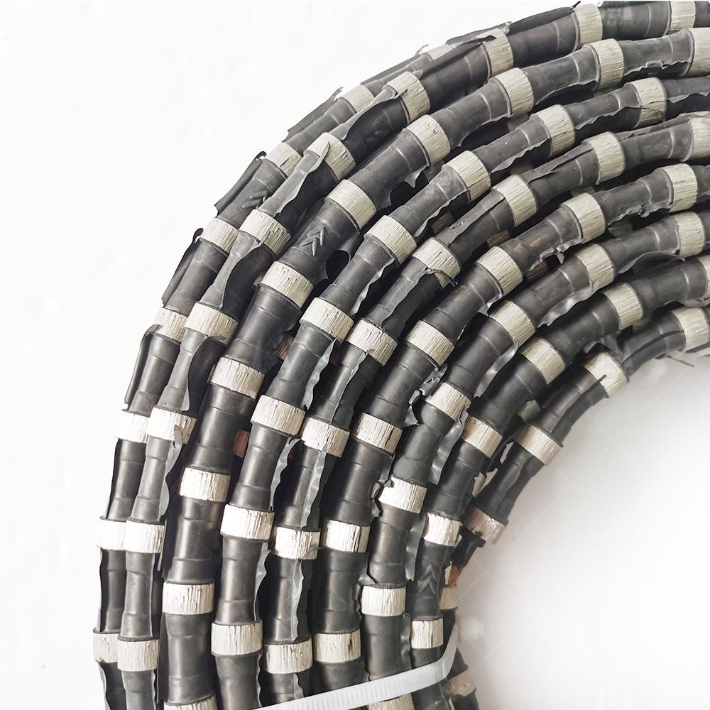 Close-up of Diamond Wire Saw, highlighting the rubber coating and cutting beads.