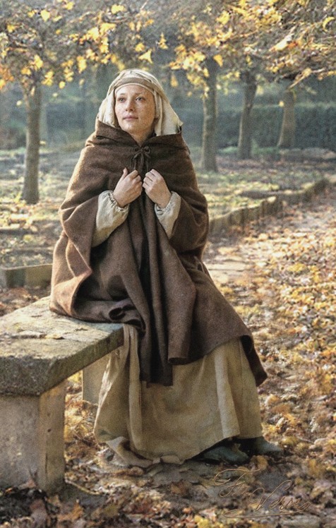 Sacred artwork by Faith and Verse. © Faith and Verse, 2026. All rights reserved. Saint Aldegundis of Maubeuge in contemplation at the abbey garden.