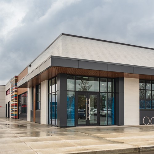 Exterior photo of modern, commercial building.