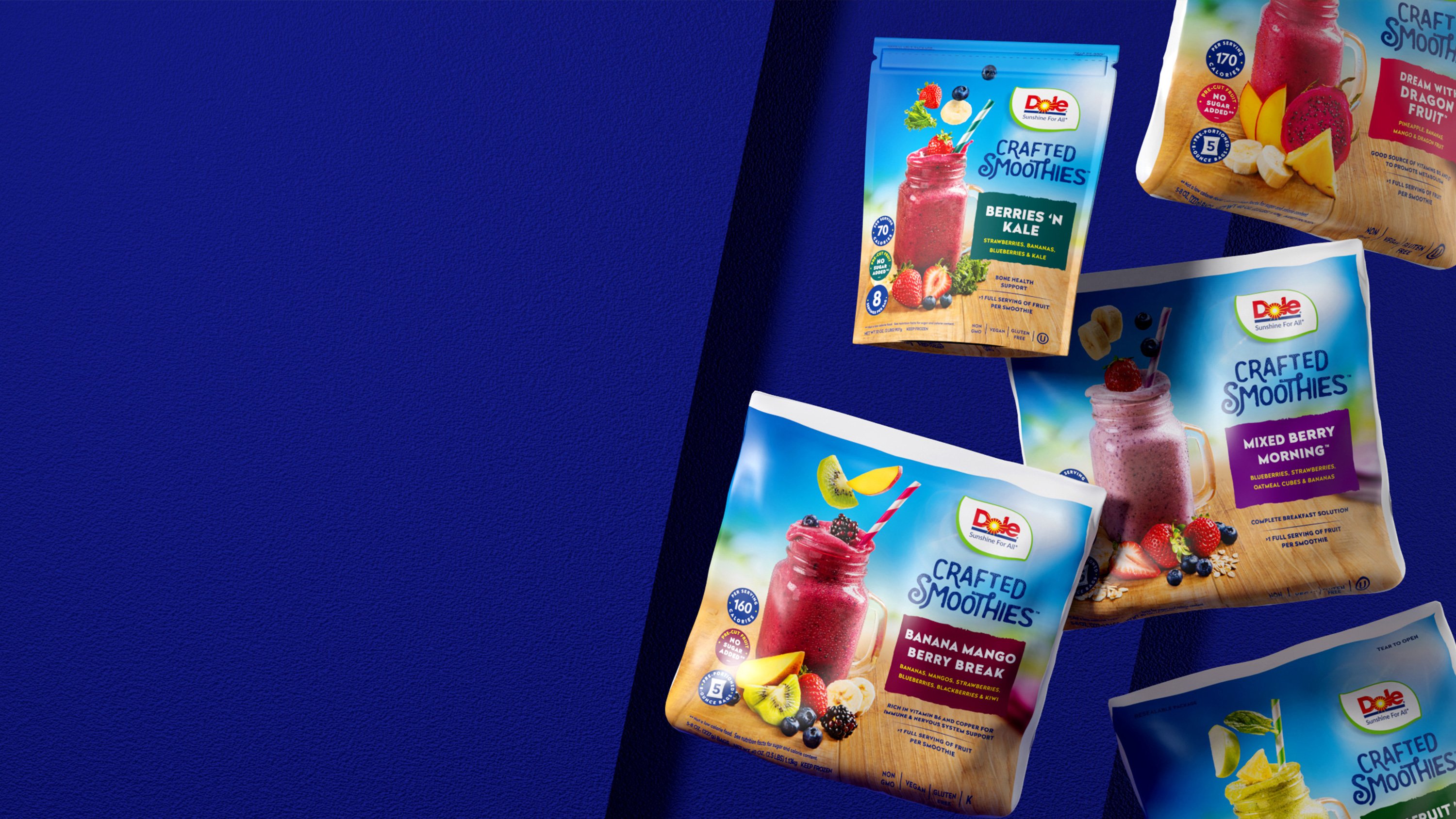 Five Dole Crafted Smoothies packets are displayed against a vibrant blue textured background. Bright, colorful fruit images suggest freshness and variety.