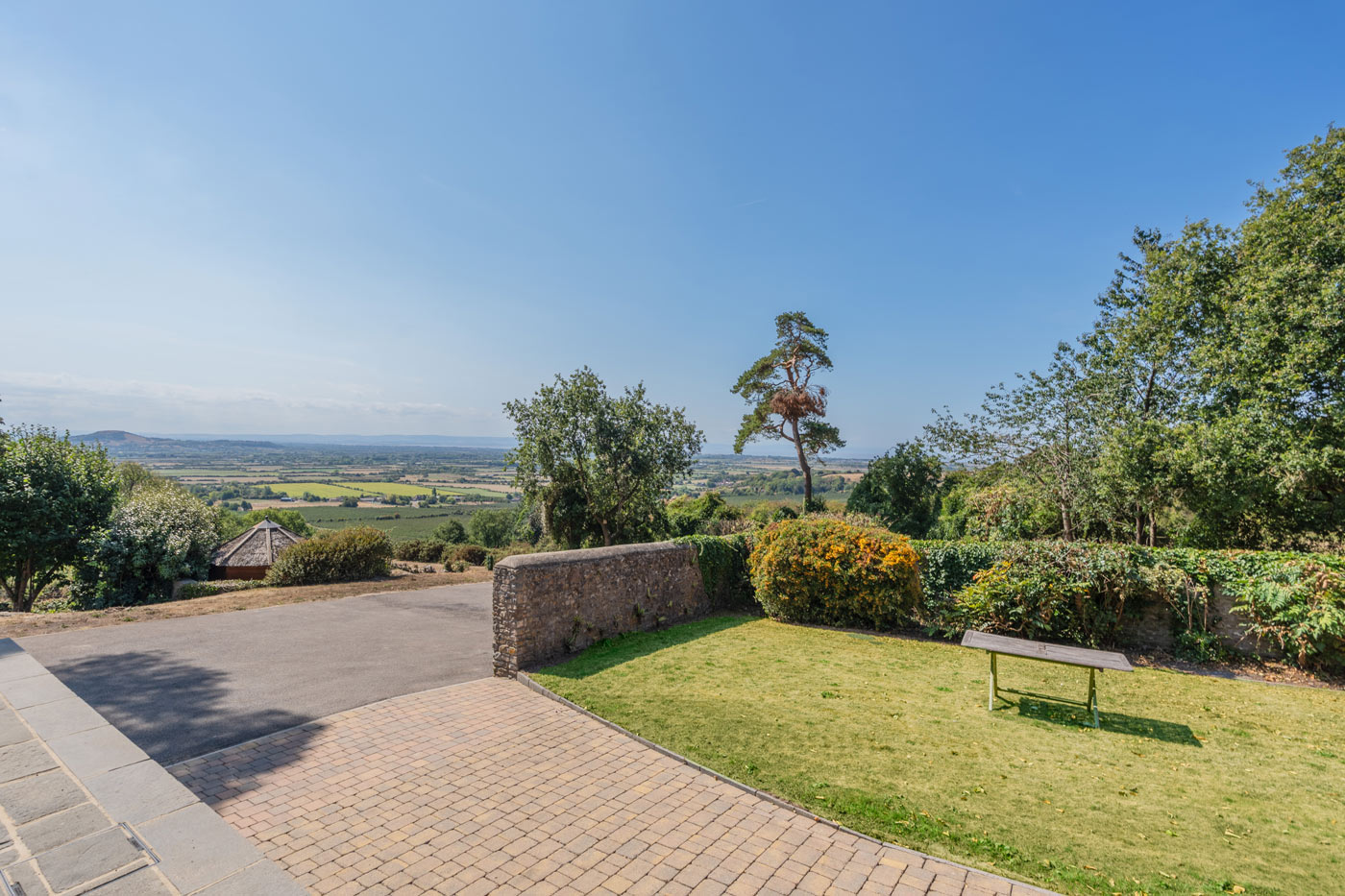terrace and lawn with panoramic countryside views