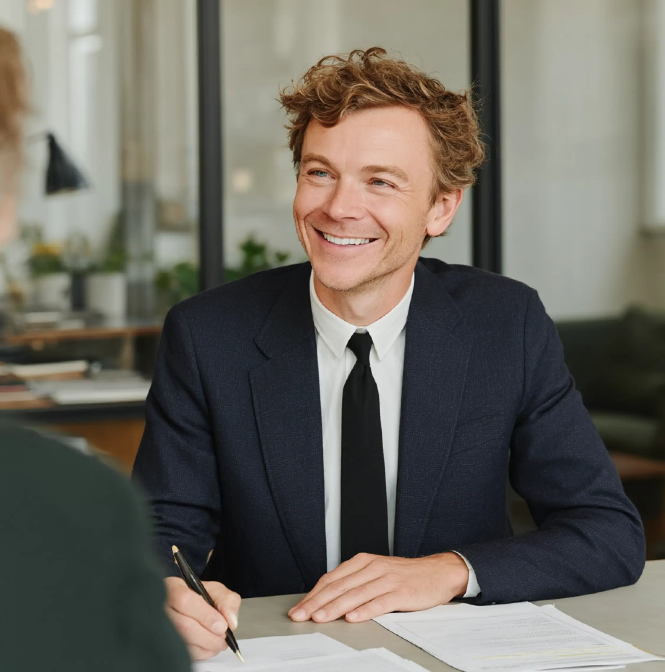 Lawyer looking at client