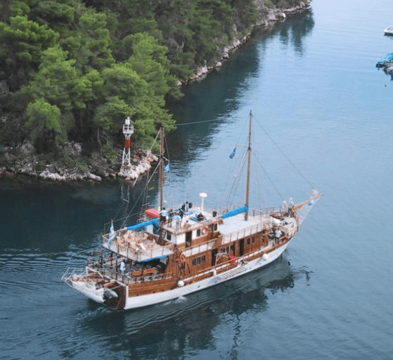 Night view of desert camp with lanterns and stars in the sky