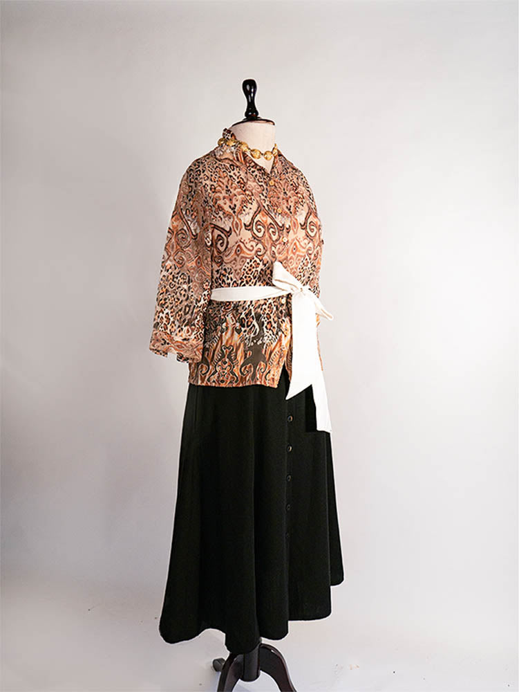 Vintage mixed animal print blouse with 3/4 sleeves.