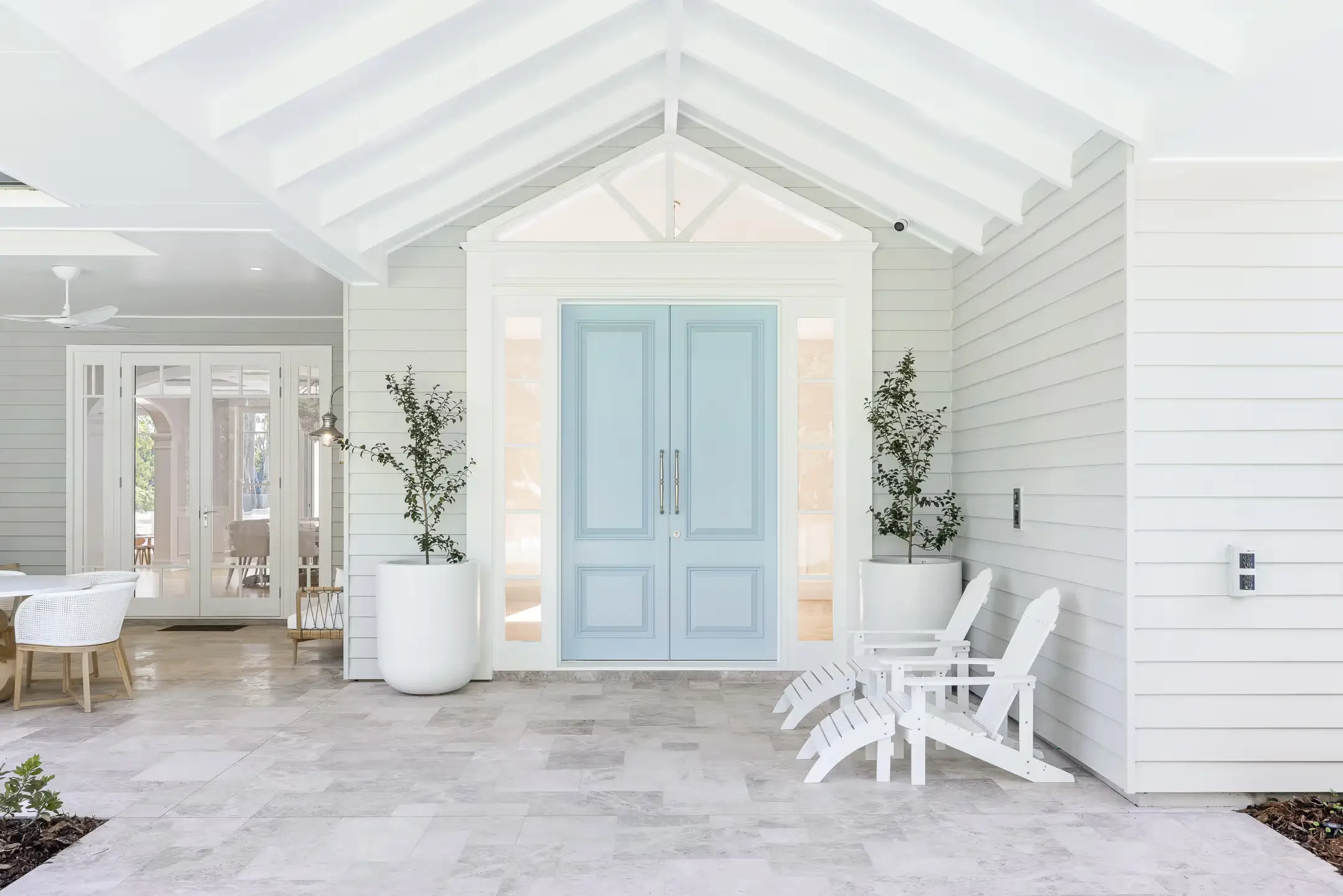 Close up of blue front door in this modern Brisbane American Hamptons modern coastal design