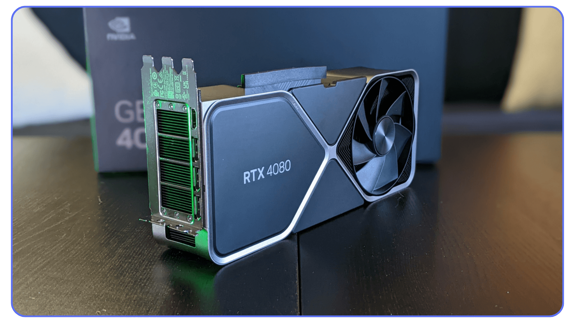 Nvidia RTX 4080 graphics card photographed at an angle showing the cooling fins and large single fan.