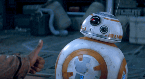 GIF of BB-8 giving a "thumbs-up" gesture with a small torch