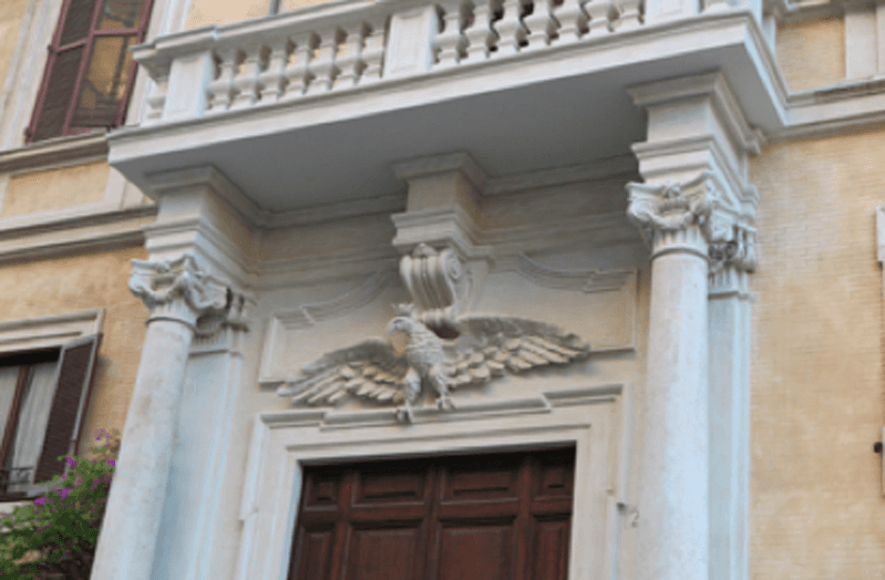 front entrance door decorations with an eagle statue