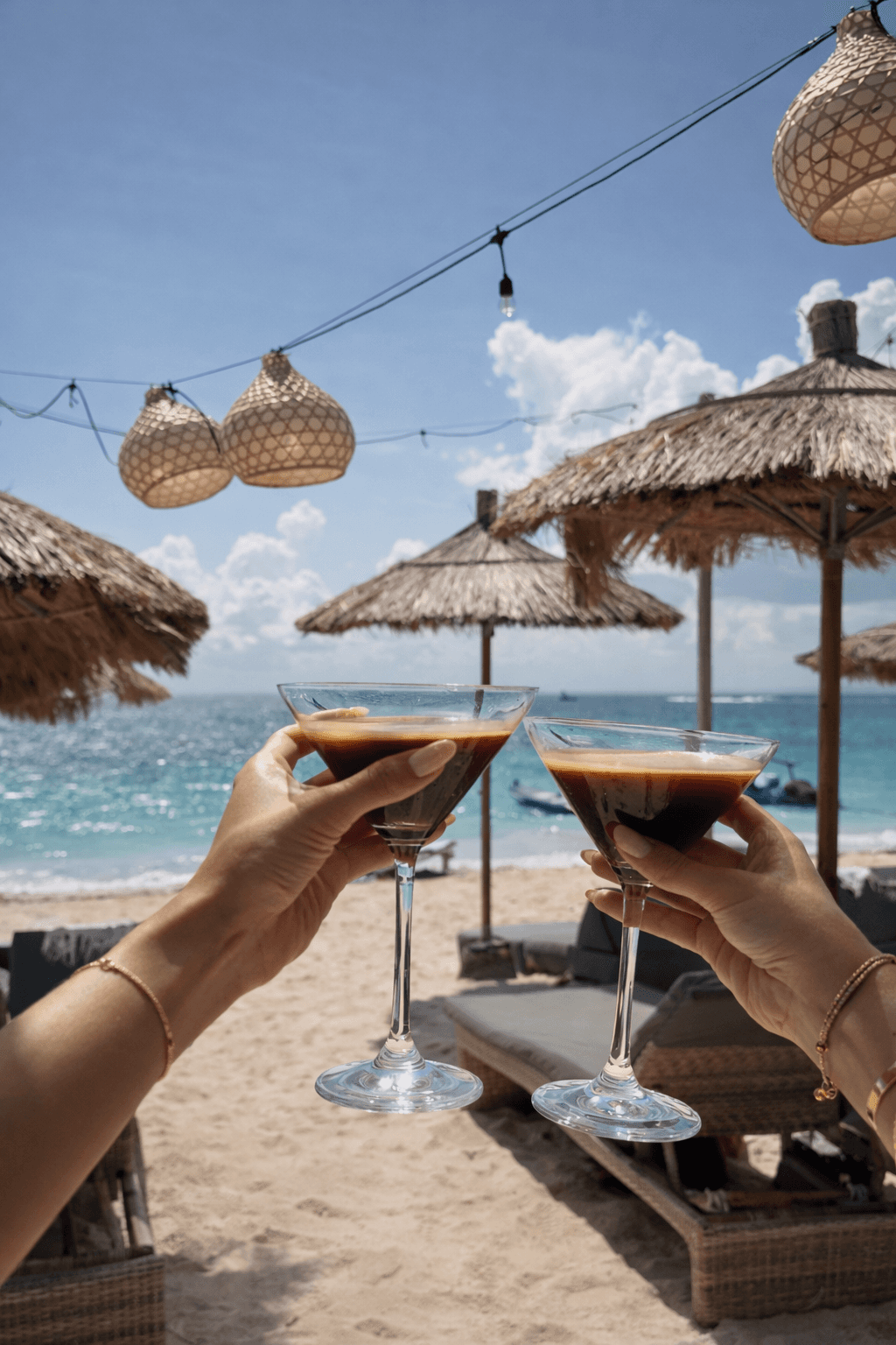 A close-up shot of a handcrafted welcome cocktail served at a Mediterranean hotel patio