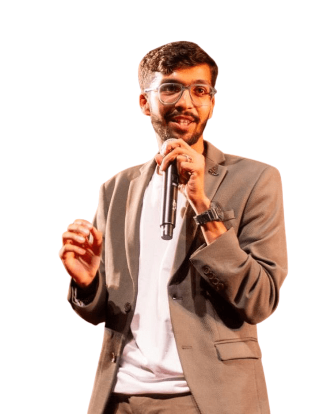 Woman working on a laptop computer at a table in a bright room.