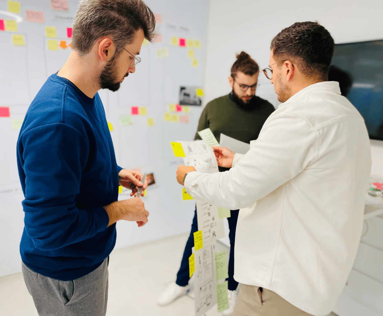Group facilitation helping teams think smarter together during an interactive session