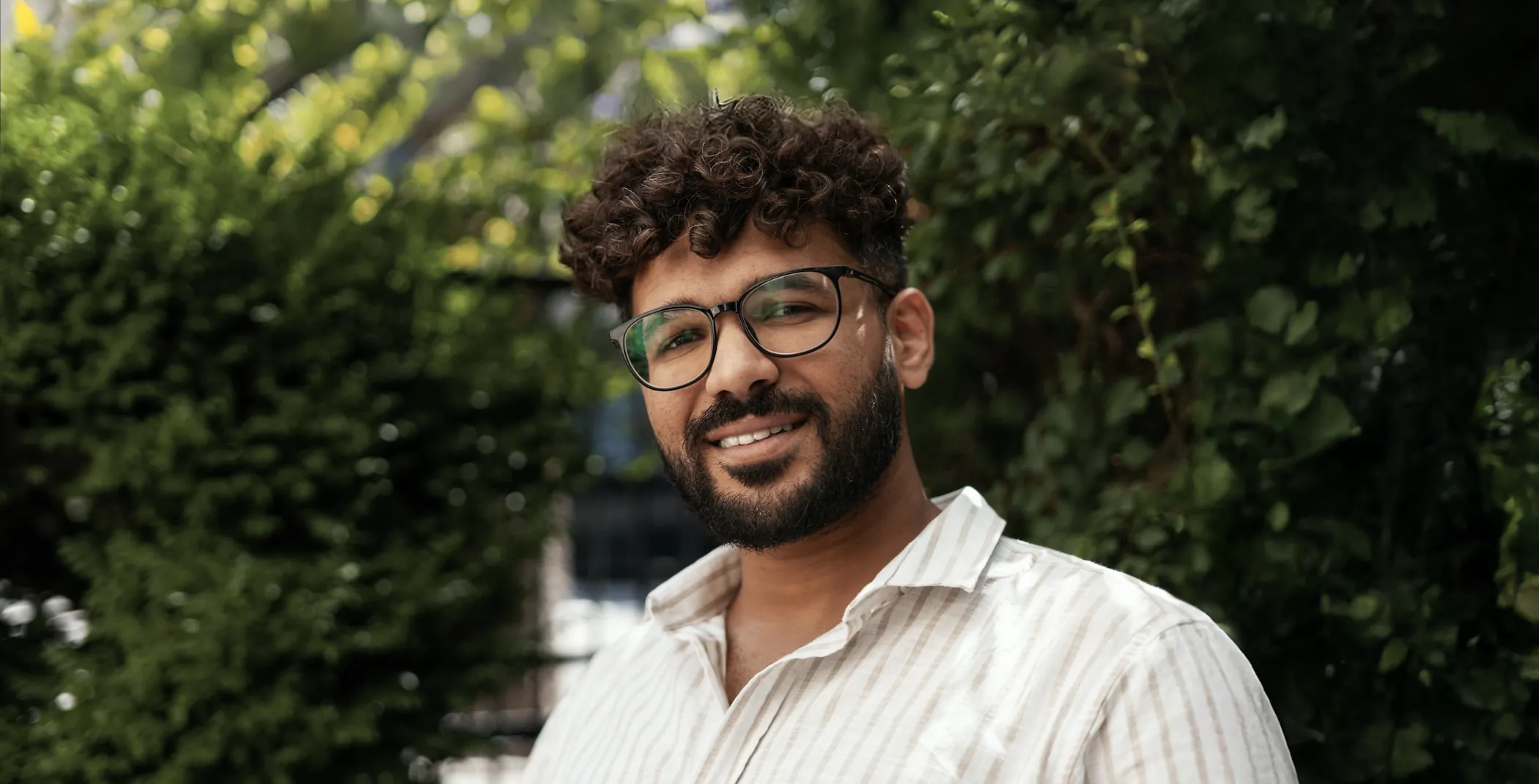 Smiling man with glasses