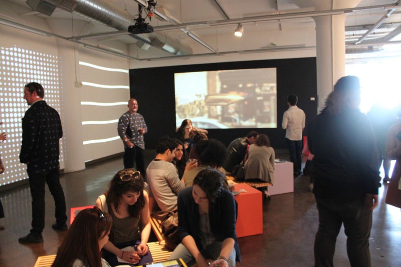 people visiting the exhibition gallery