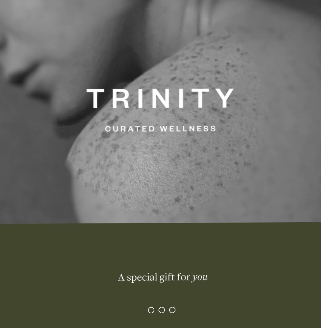 Blonde-haired woman dressed in white, gently striking a sound bowl, filling the space with soothing vibrations.