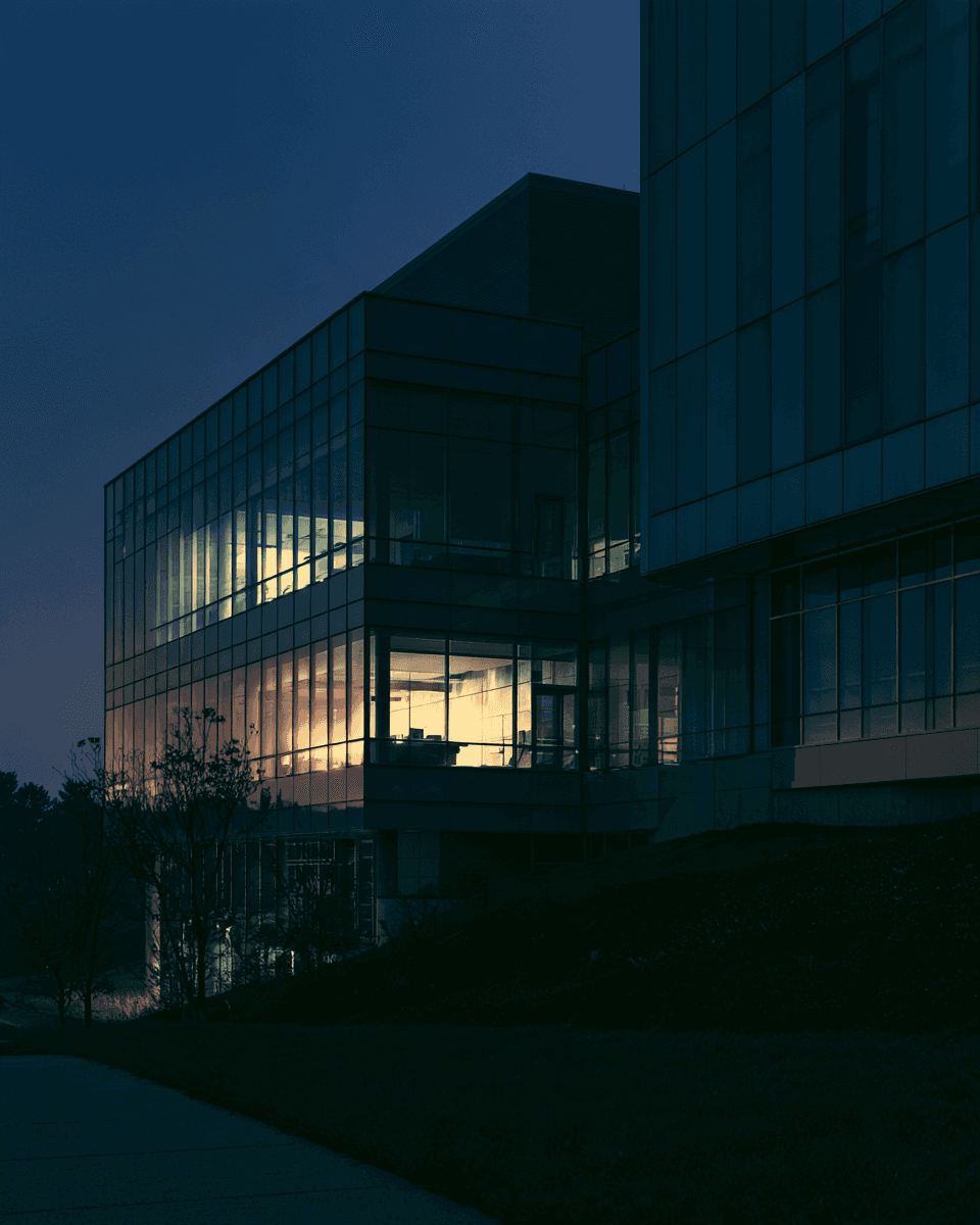 Glass research building at blue hour
