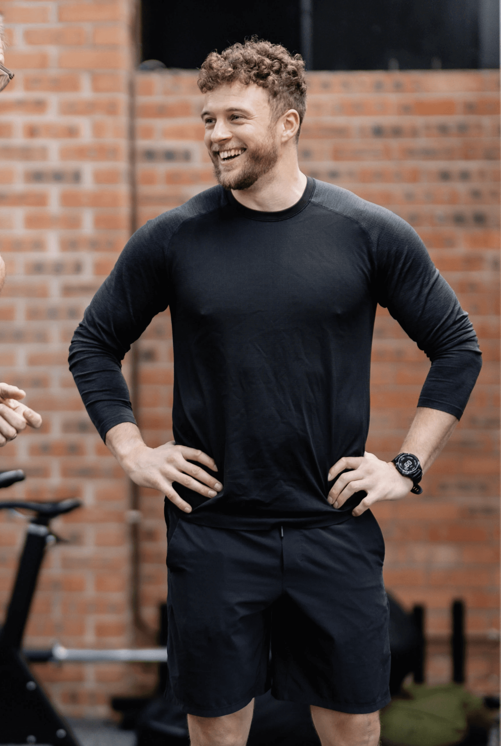 The image features a stylized figure with a unique, abstract design. The main subject appears to be a humanoid form with a wooden texture, wearing a blue robe.