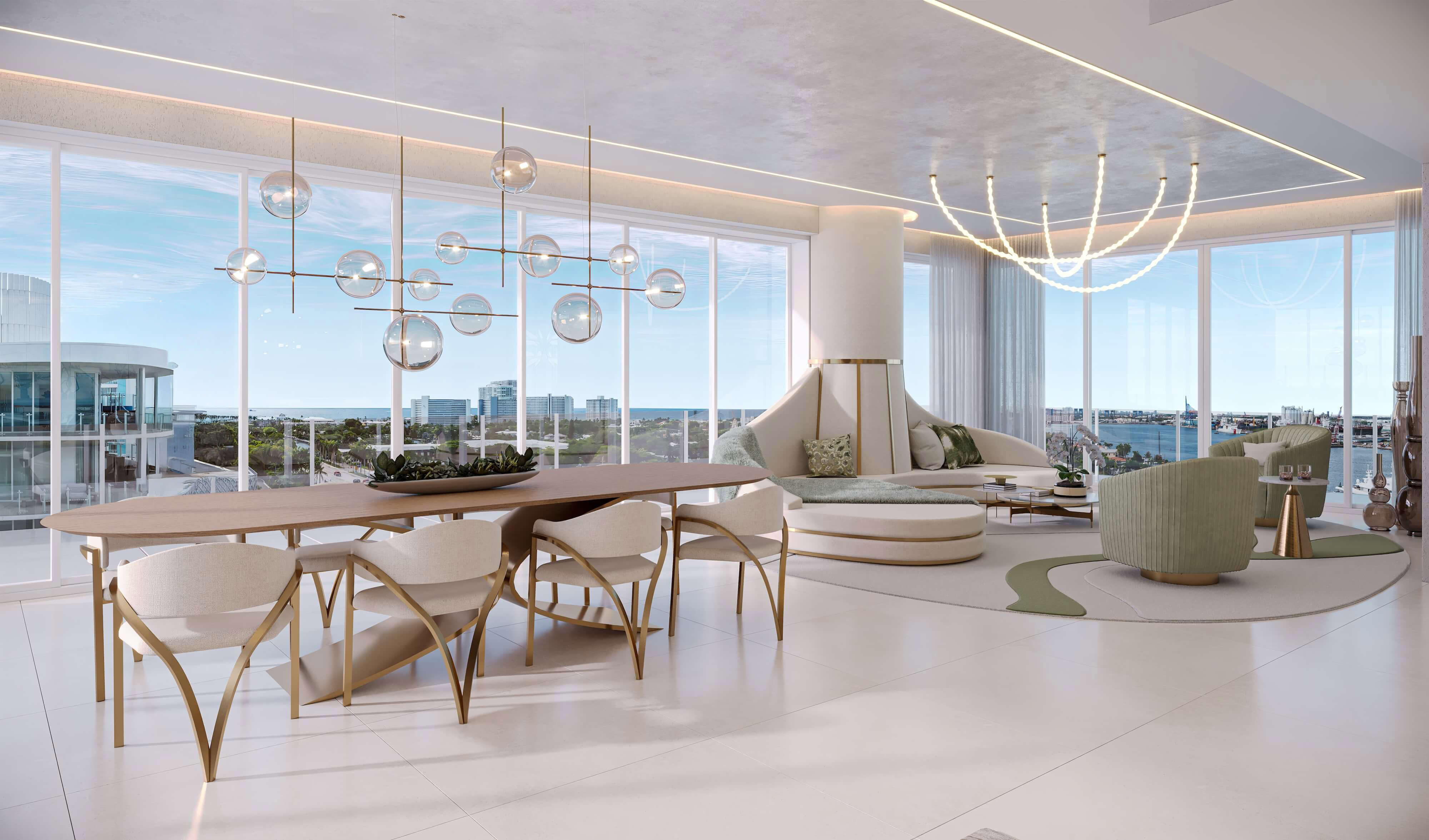 Luxury living room with curved fireplace seating, sculptural chandelier, and panoramic waterfront views.
