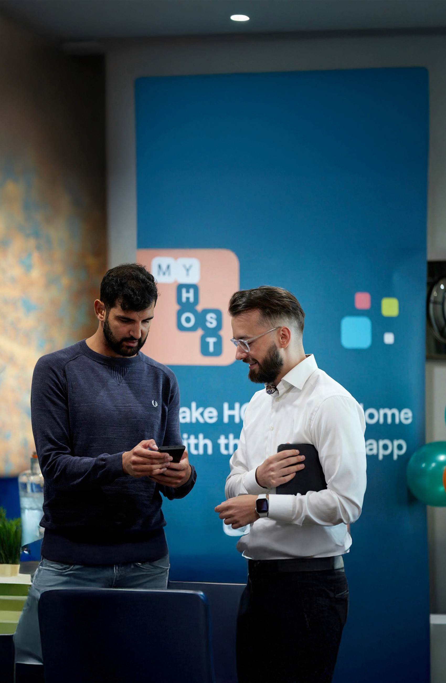 Person in a white off-shoulder top using a MacBook laptop, with text overlay 'What's new in digital?' and the fabrica® logo in the top corner.