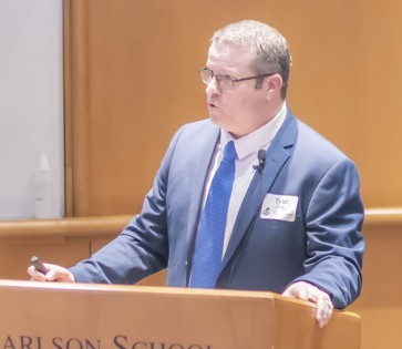 Tyler Wirth speaking to an audience about personal growth.