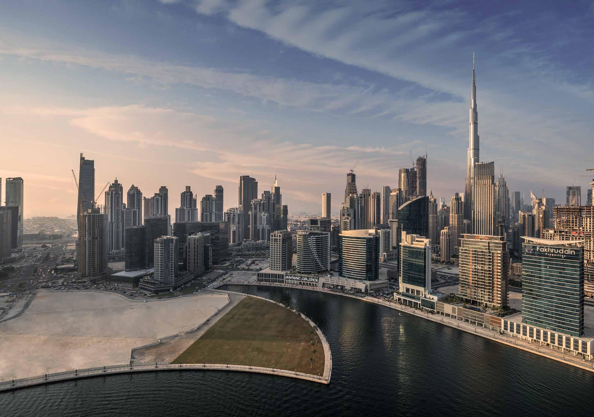 Stunning city skyline and waterfront view, featuring prime real estate in a prestigious business district.