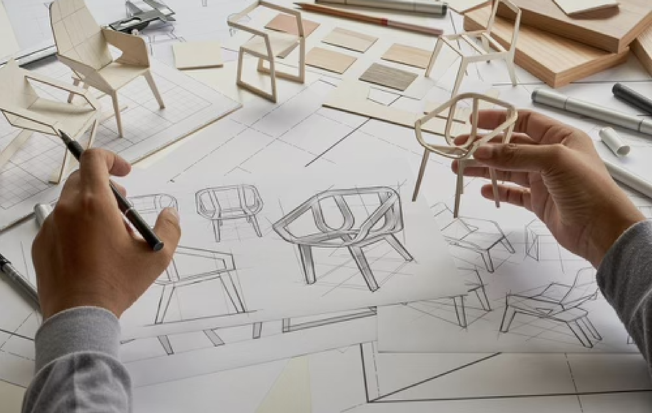 Person designing a chair prototype.