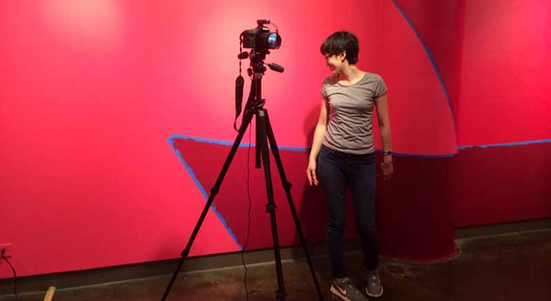 a woman filming