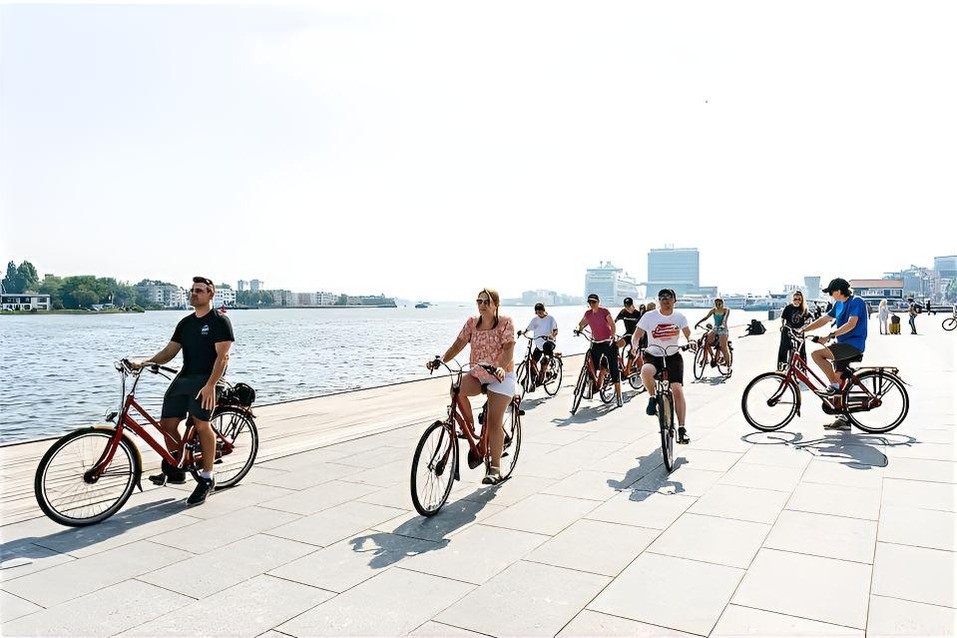 Cycling along the IJ towards Amsterdam-Noord