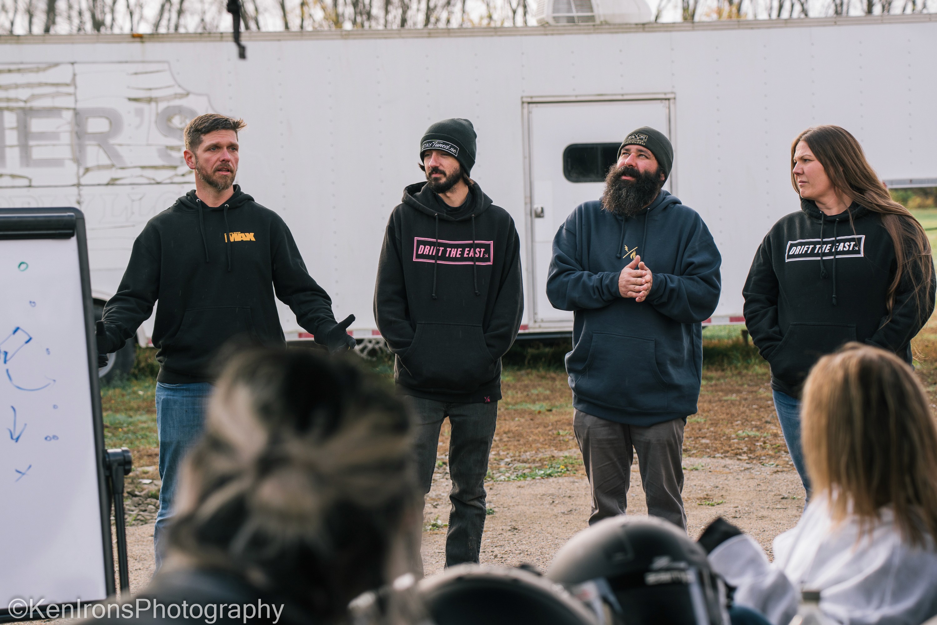 nfinity pool blending into the ocean view, minimalist sun loungers in soft neutral fabric, curved architecture
