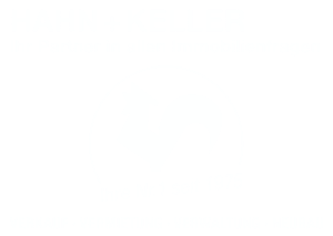 HAHN + KELLER logo: white stylized rooster on a green background.
