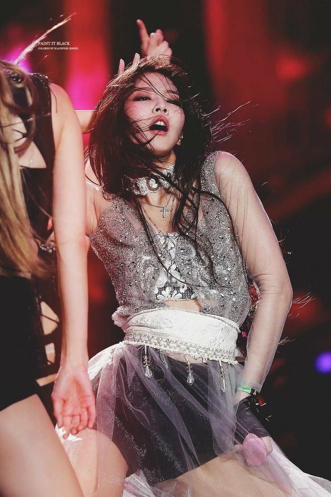 Jennie of BLACKPINK performing at a concert, photographed by Paint It Black