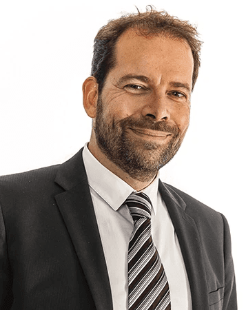 Portrait of John Doe Anderson, CEO of Omnis.
