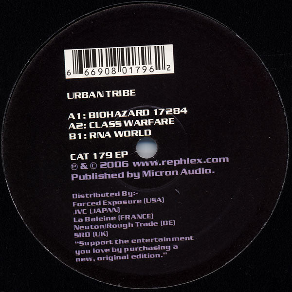 Back of a vinyl record label with text and a barcode on a black background