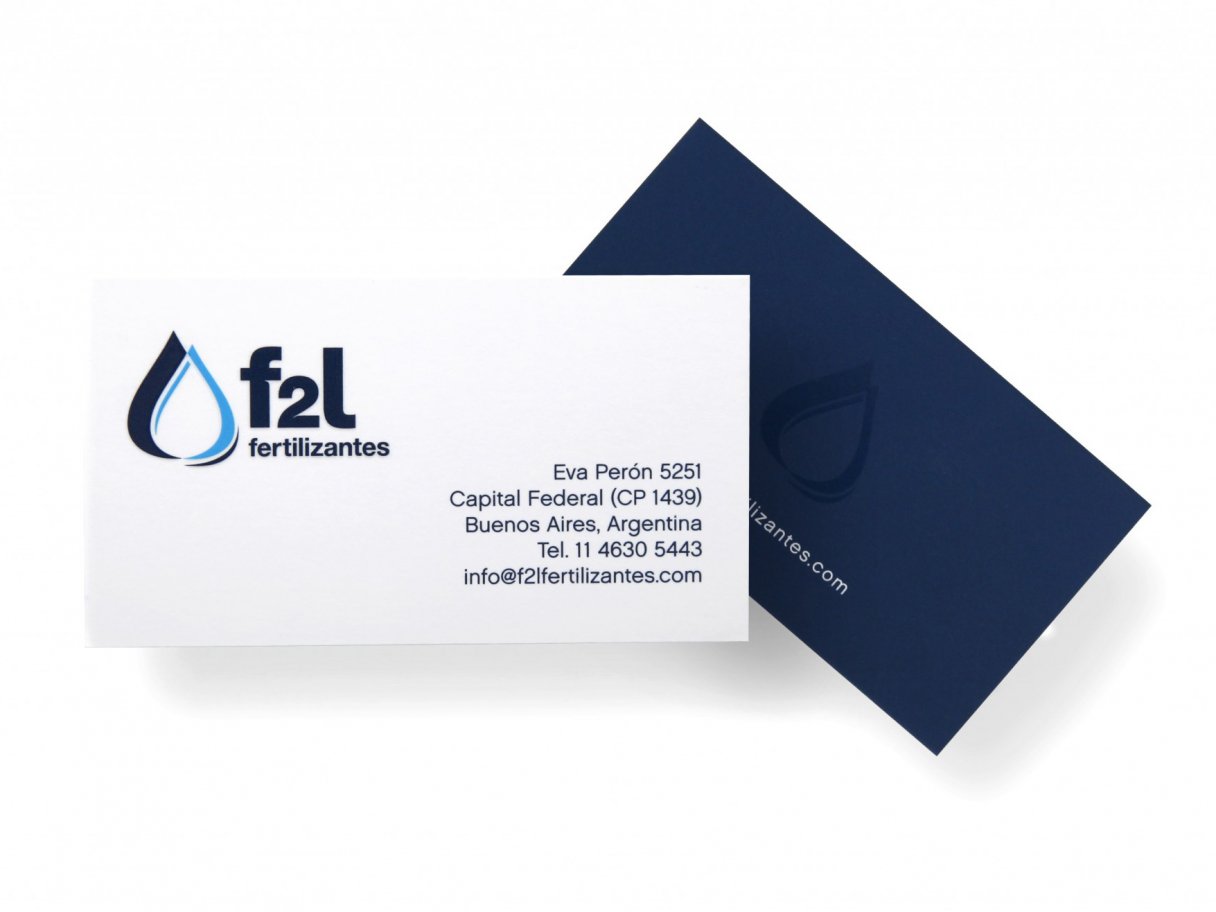 Rooftops of a coastal town with the sea in background