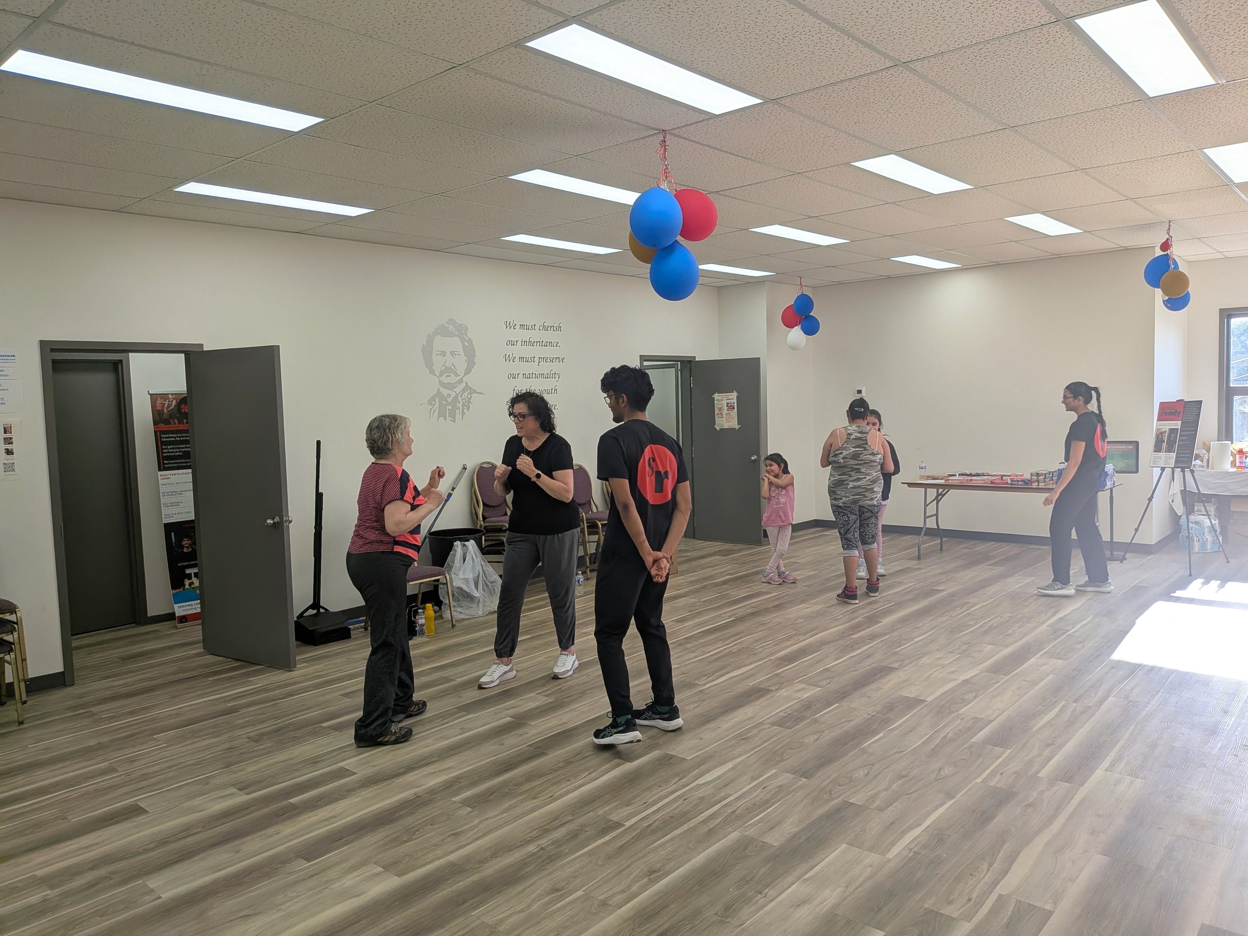 children-and-adults-attentively-listening-in-a-taekwondo-class-session-indoors. - rdne-stock-project (pexels)