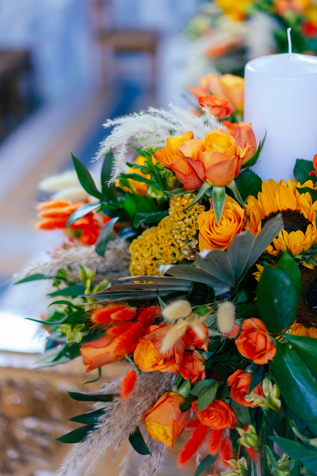 Close-up of a romantic beach wedding floral arch with white drapes by the sea in Messinia Greece