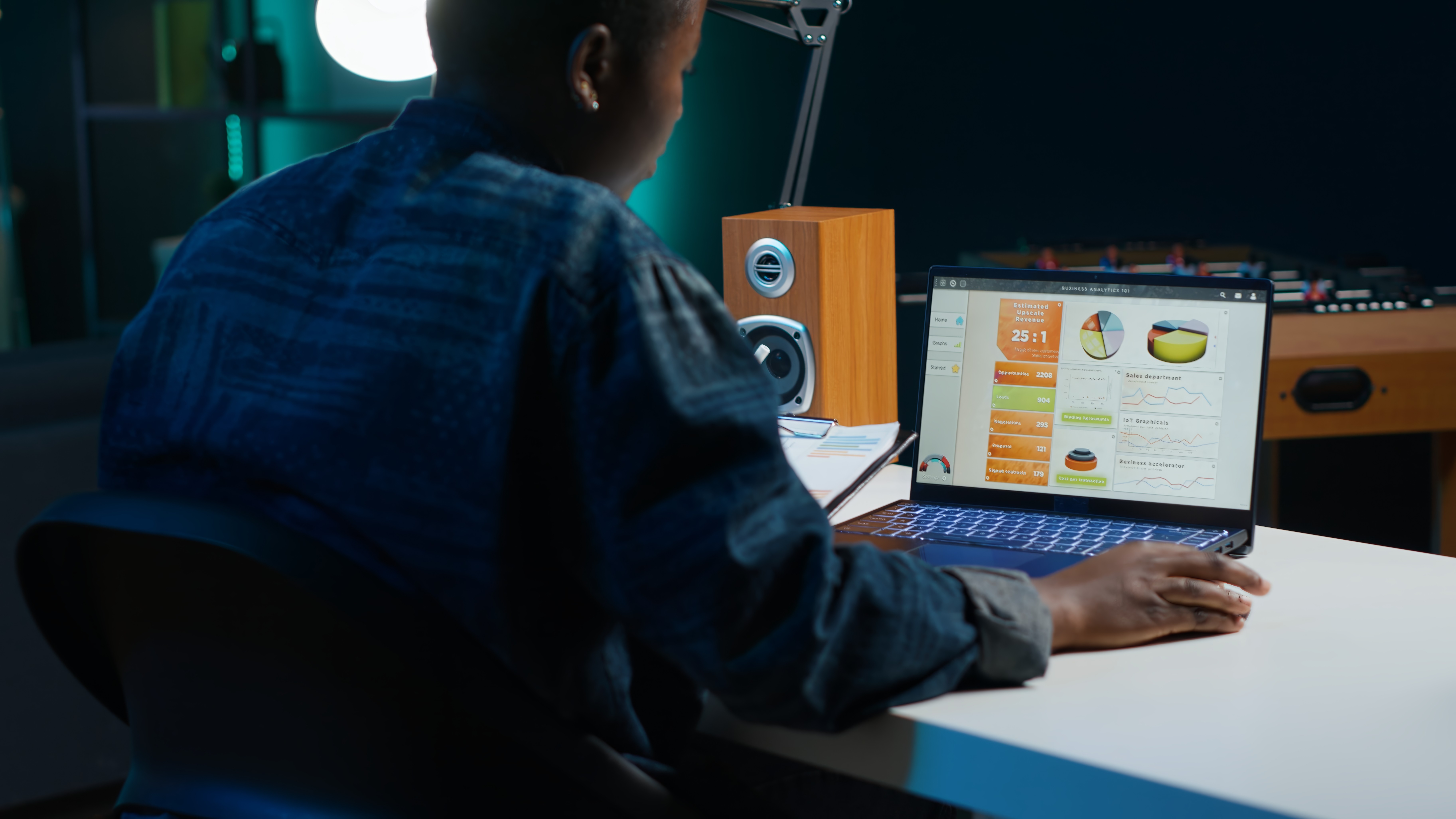 a black background with neon colored shapes