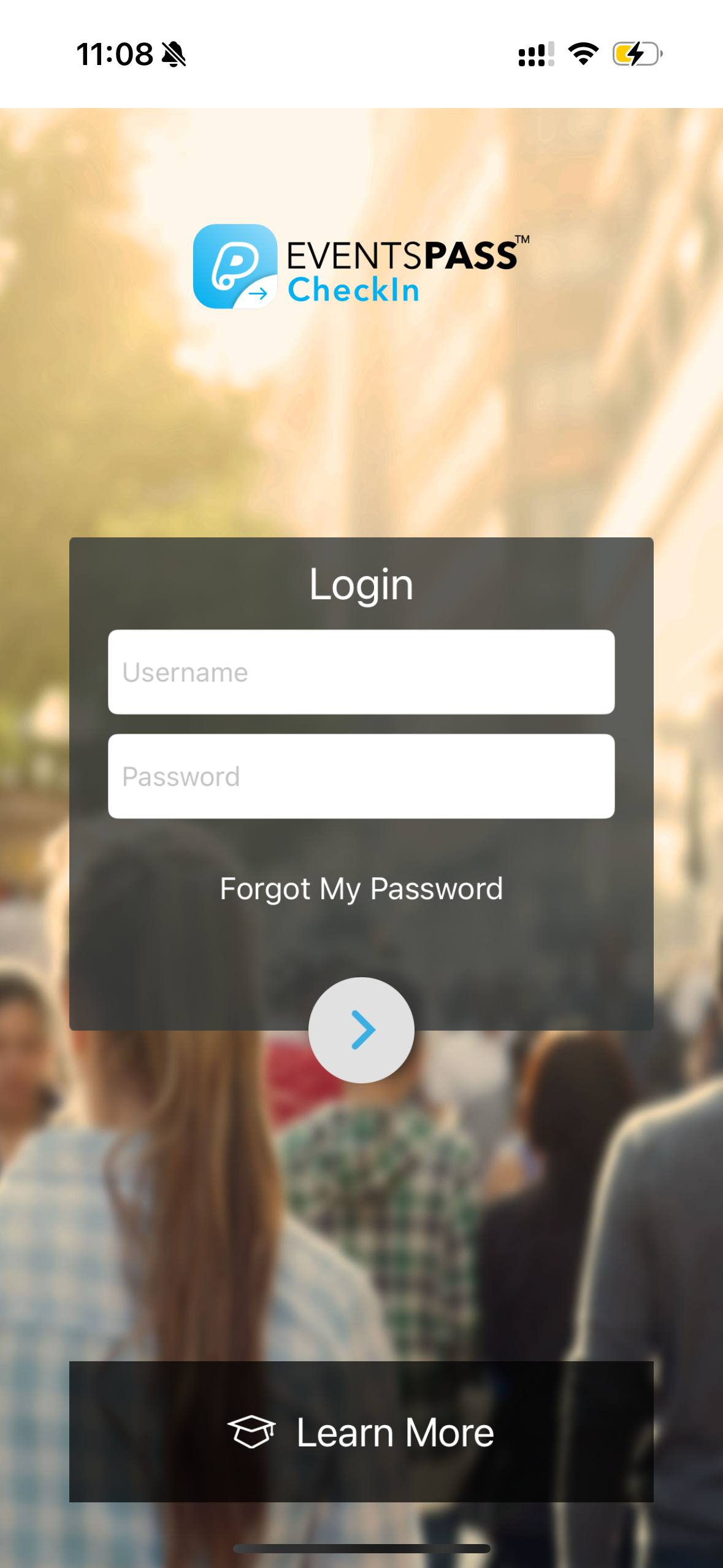a hand holding a black device