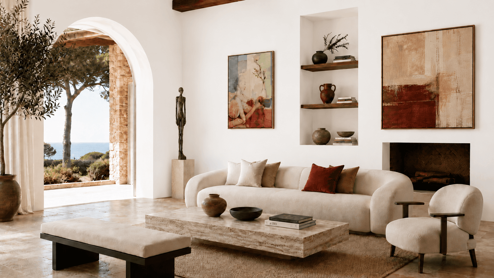Warm Mediterranean living room with arched opening, sculptural furniture, artwork, natural materials and a sea view.